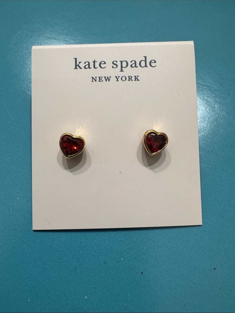 kate spade gold-tone earrings with red heart crystals